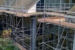 view of an office block with full scaffolding in place by Kingsley Scaffolding