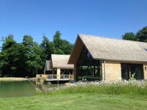 Handmade sweet chestnut roof shakes installed by Kingsley Roofing at the open air museum in Chichester, Sussex.