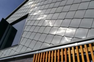 Zinc detail shingle cladding